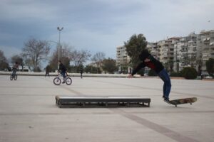 boy falling off skateboard