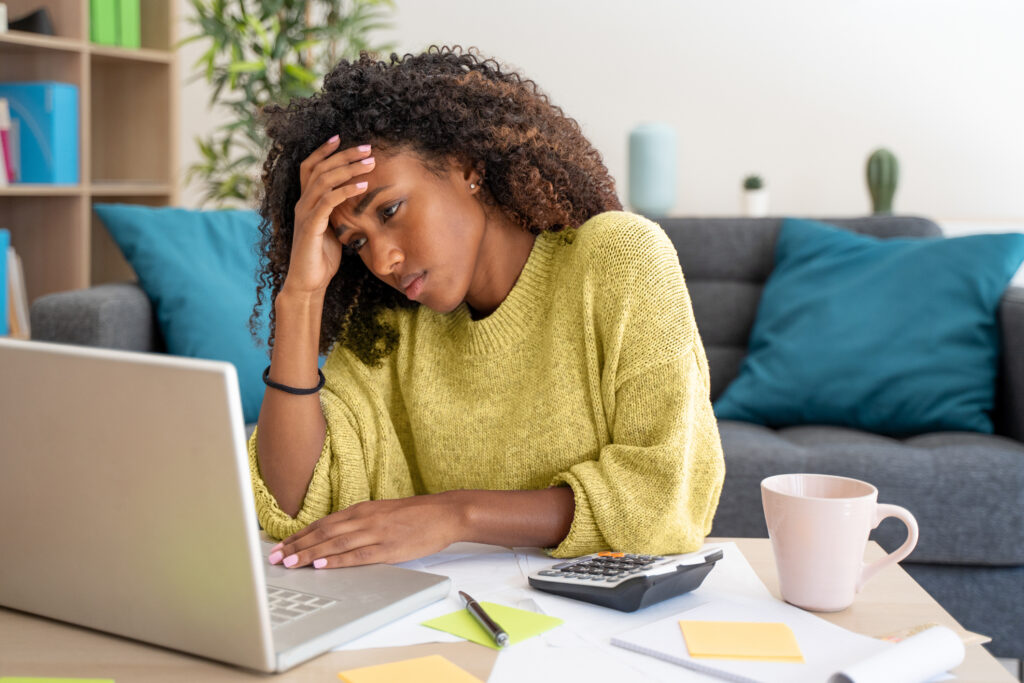 Stressed woman looking for healthcare costs